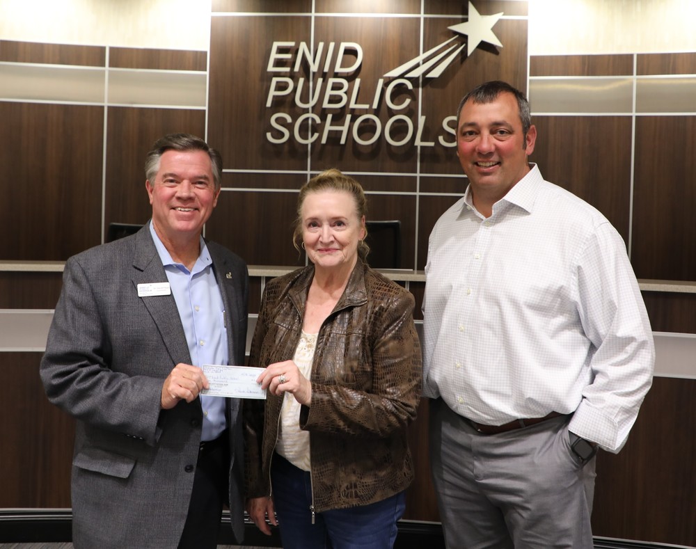Dr. Darrell Floyd, Superintendent of EPS schools, Maxine Shepherd with Chisolm Trail Coalition, and Dr. Sam Robinson, EPS CFO and COO.